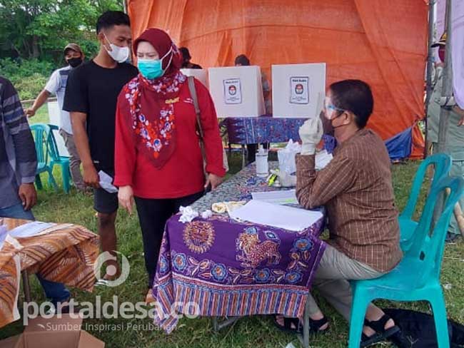 r Umie Kulsum Monitoring Pelaksanaan Pilkades di Kecamatan Pakuhaji