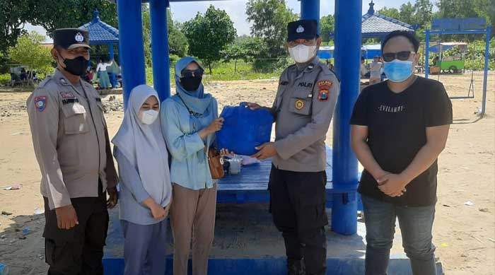 Wisatawan Pantai Camplong Dapat Doorprize dari Polres Sampang Ini Syaratnya